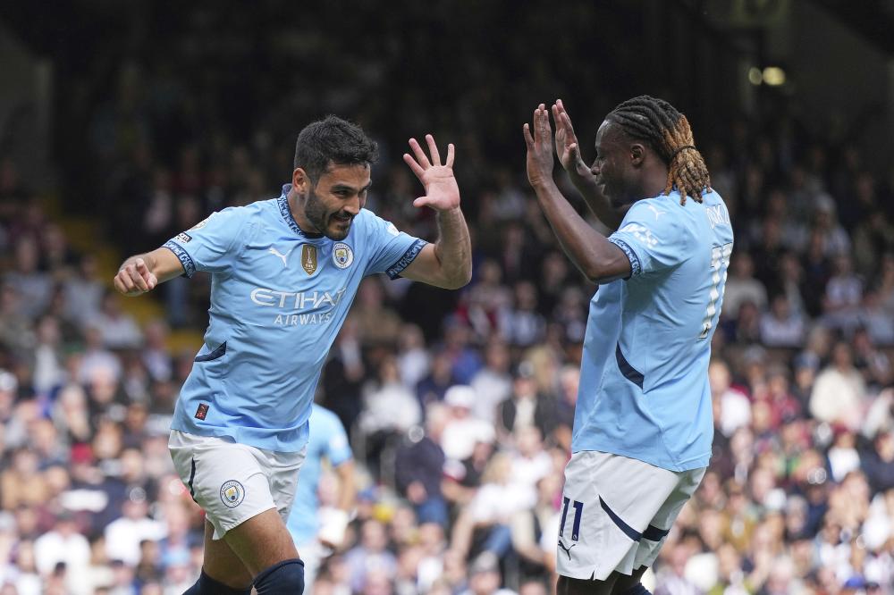 曼城斯特林梅开二度击败热刺